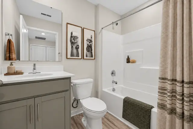 Pearson hall bathroom with vanity and tub-shower