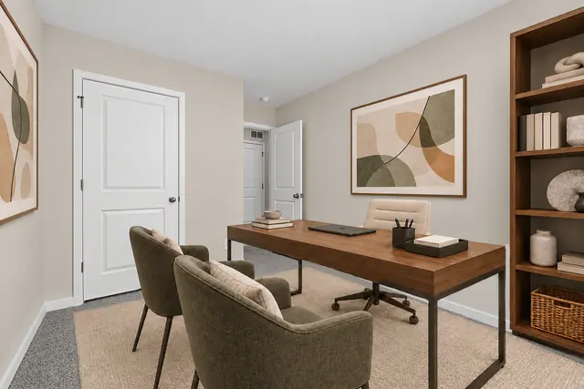 Pearson bedroom set up as a home office with desk and bookshelf
