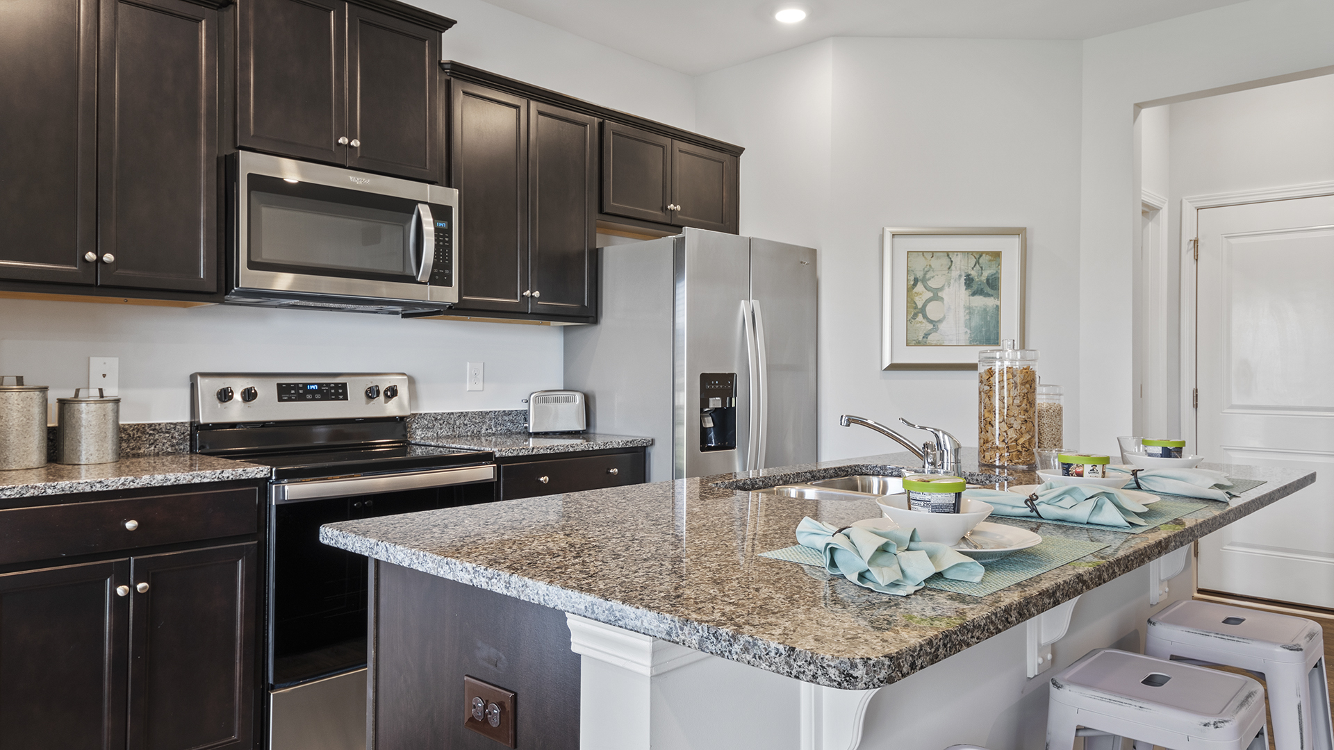 Modern kitchen with stainless steel appliances
